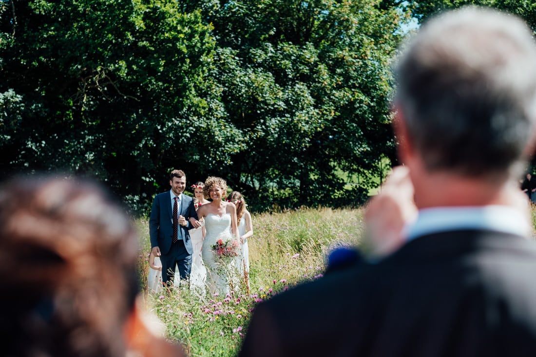 outdoor wedding ceremony in a meadow