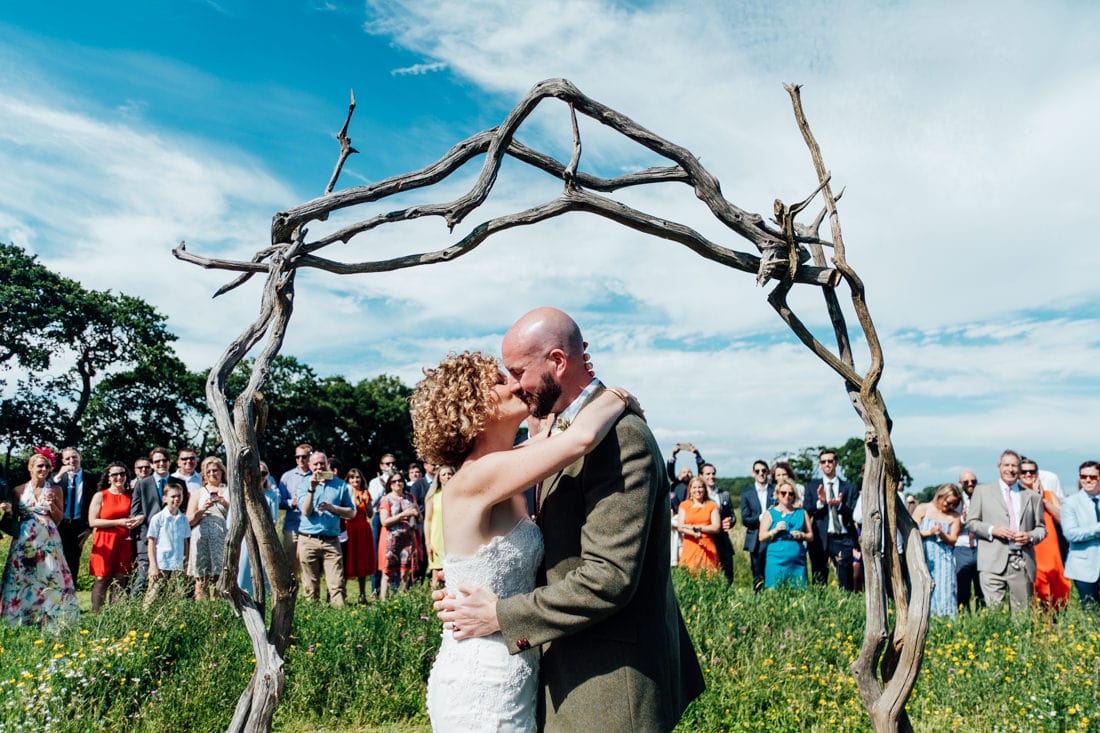 outdoor wedding ceremony in a meadow