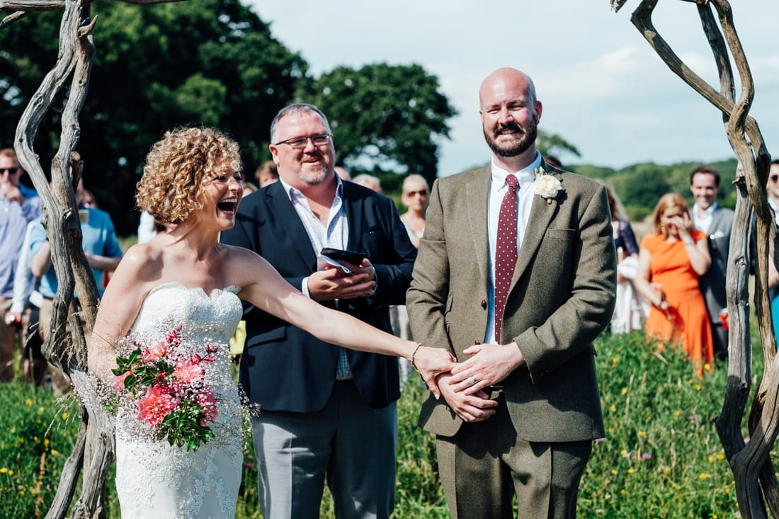 outdoor wedding ceremony in a meadow