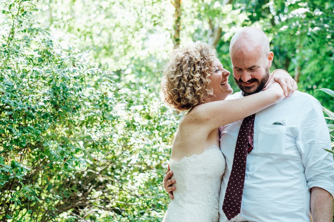 bride and groom portrait during outdoor meadow wedding