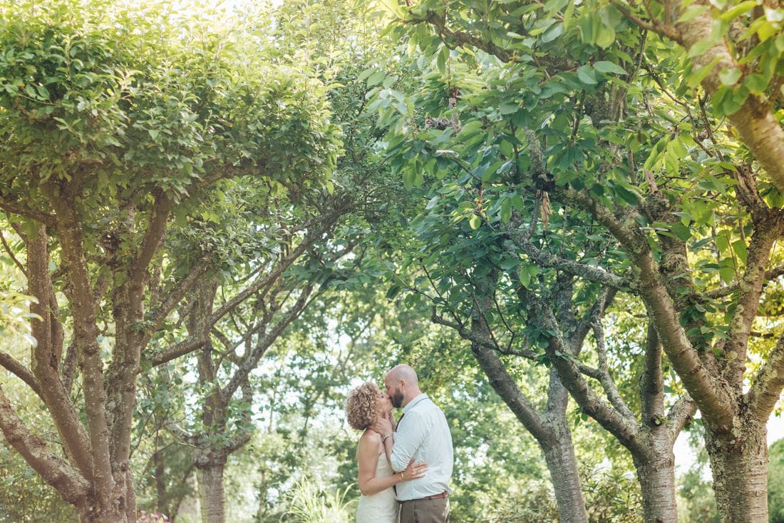 bride and groom portrait during outdoor meadow wedding