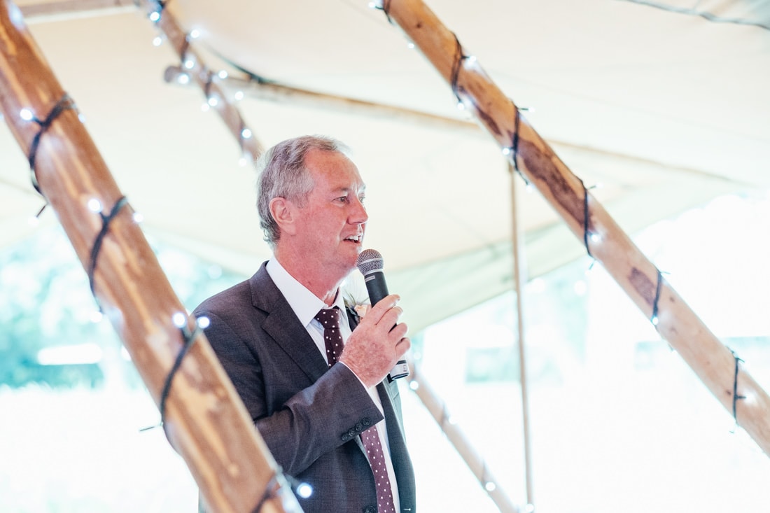 dad speaking during speeches tipi wedding in kent