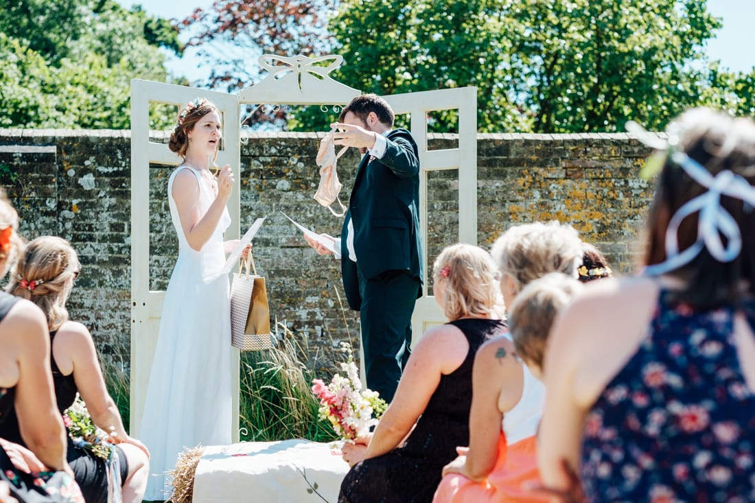 apple orchard wedding ceremony with hay bales