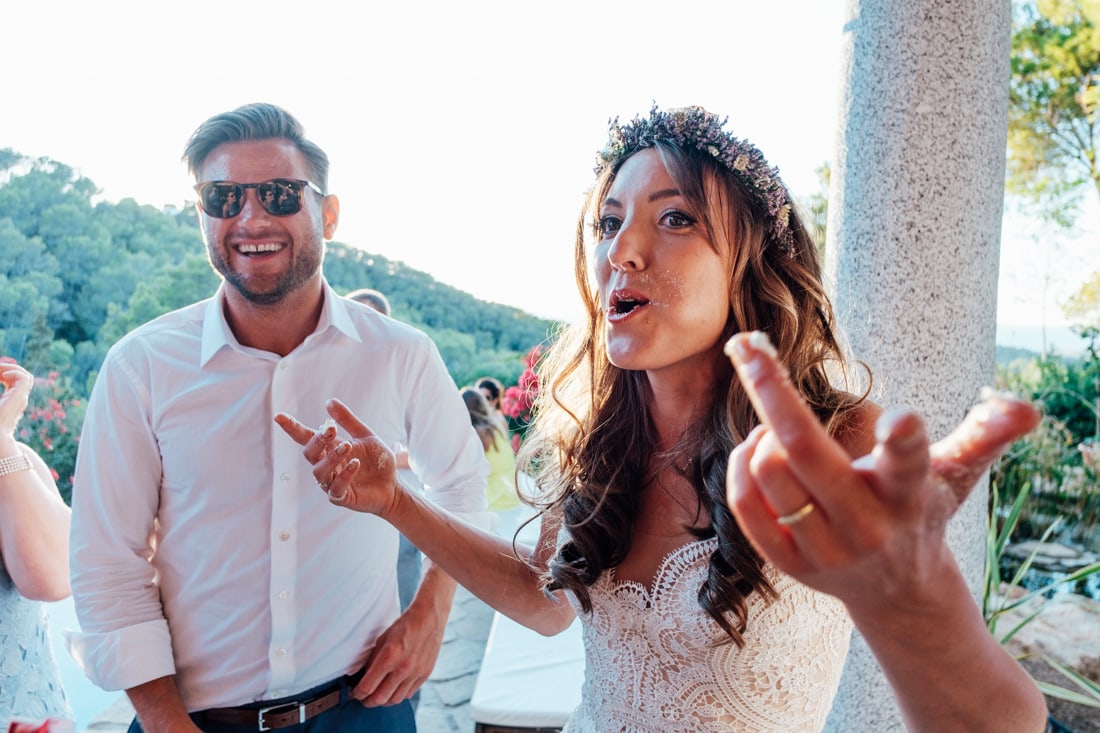 bride cutting cake at ibiza travel wedding in a villa