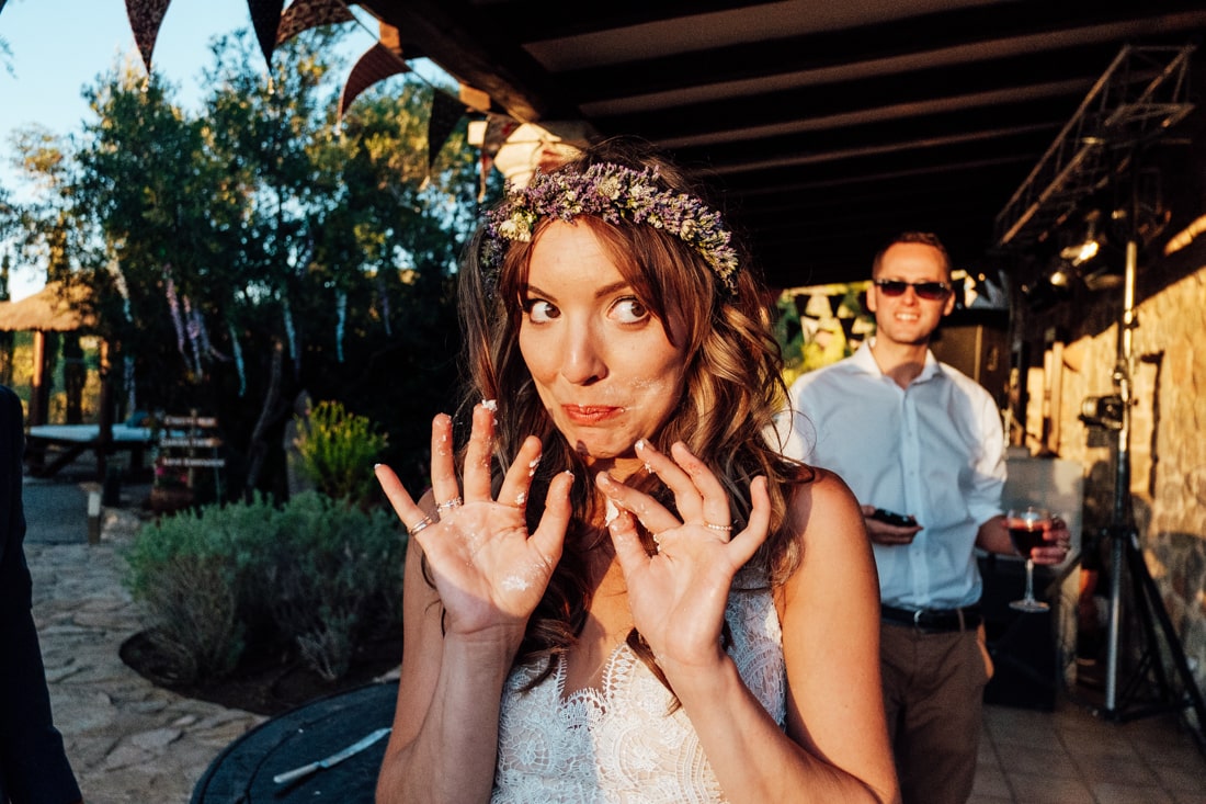 ibiza-travel-destination-wedding-67 ibiza travel destination wedding bride with cake on hands