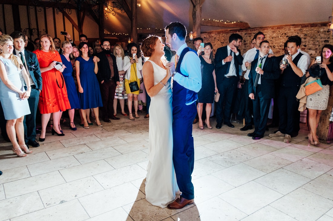 beautiful wedding first dance between bride and groom at upwaltham barns in sussex