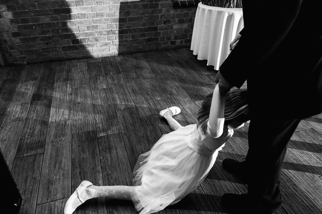 flower girl on the dancefloor at a wedding