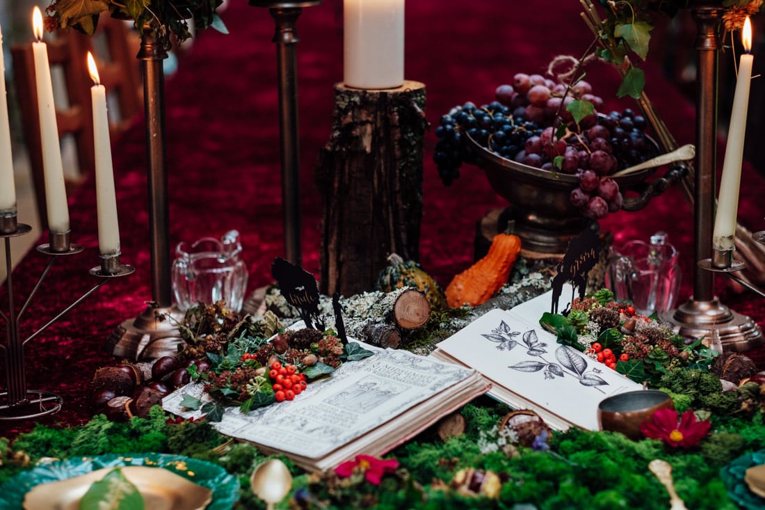 wedding table decor autumn wedding red velvet and moss and candles