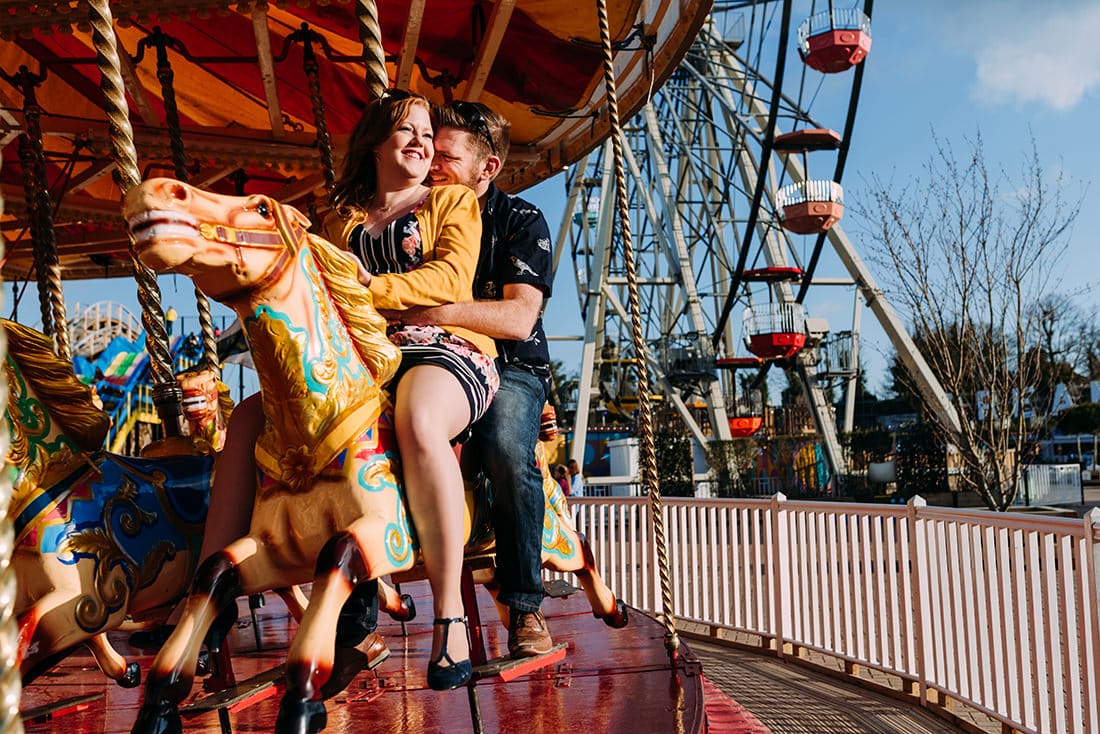 bride and groom on the rides at dreamland margate kent