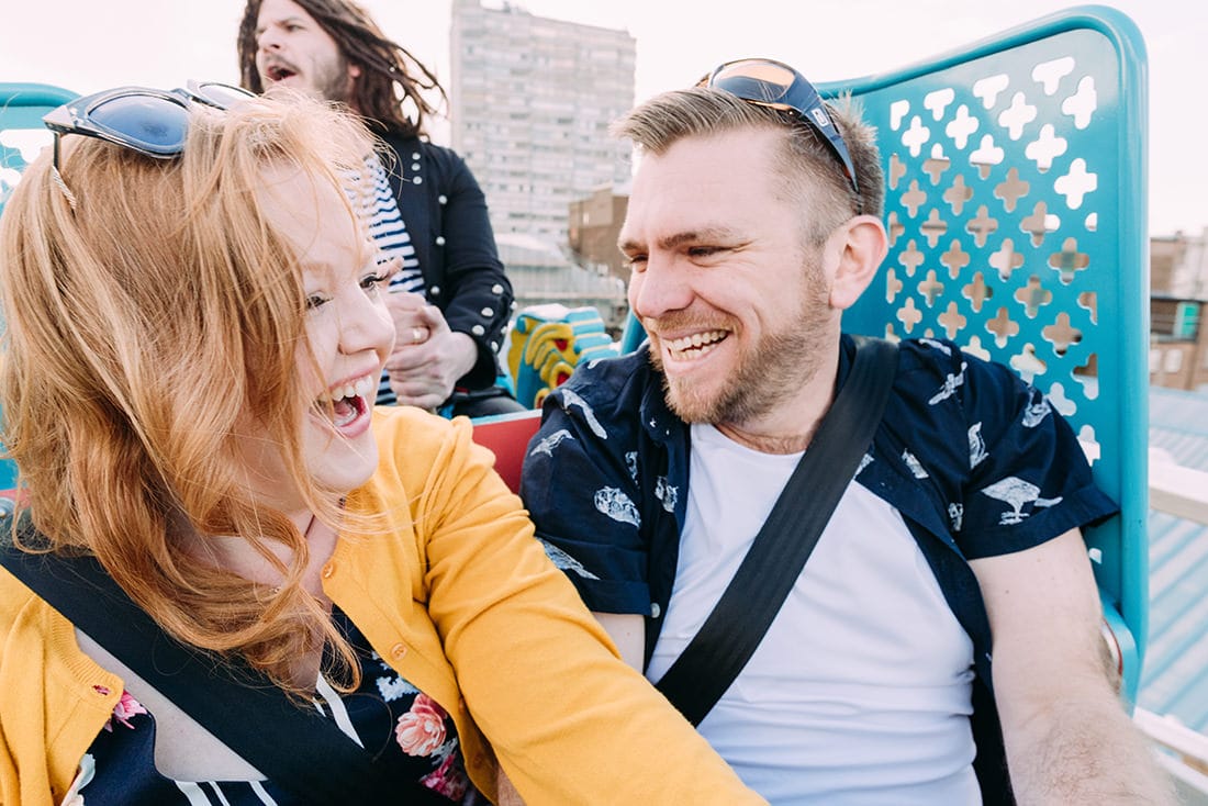 bride and groom on the rides at dreamland margate kent