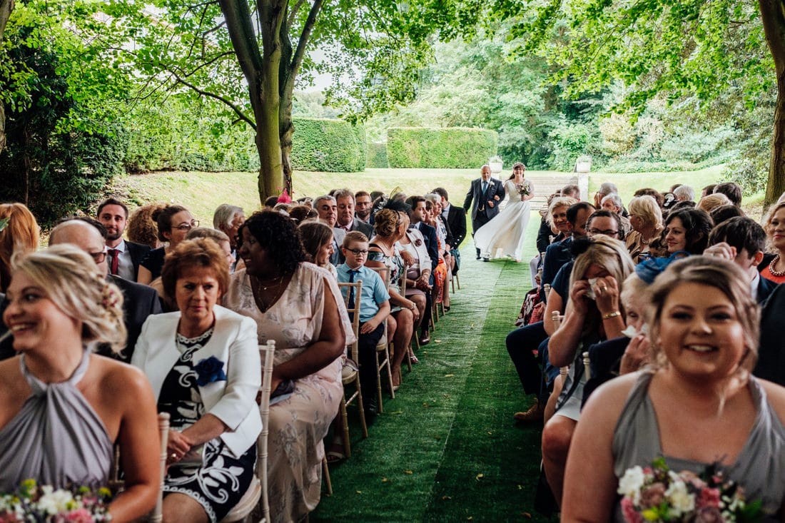 outdoor wedding ceremony back garden and tipi