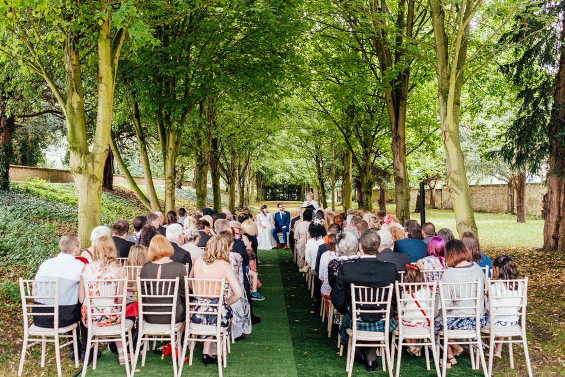 outdoor wedding ceremony back garden and tipi