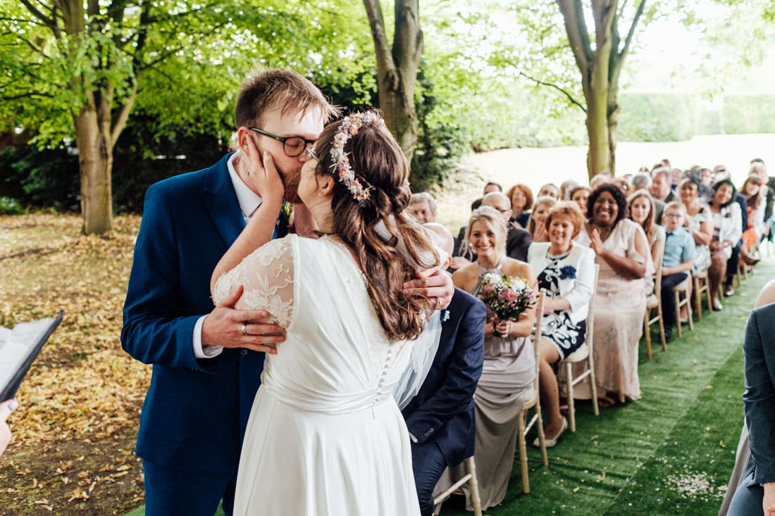 outdoor wedding ceremony back garden and tipi