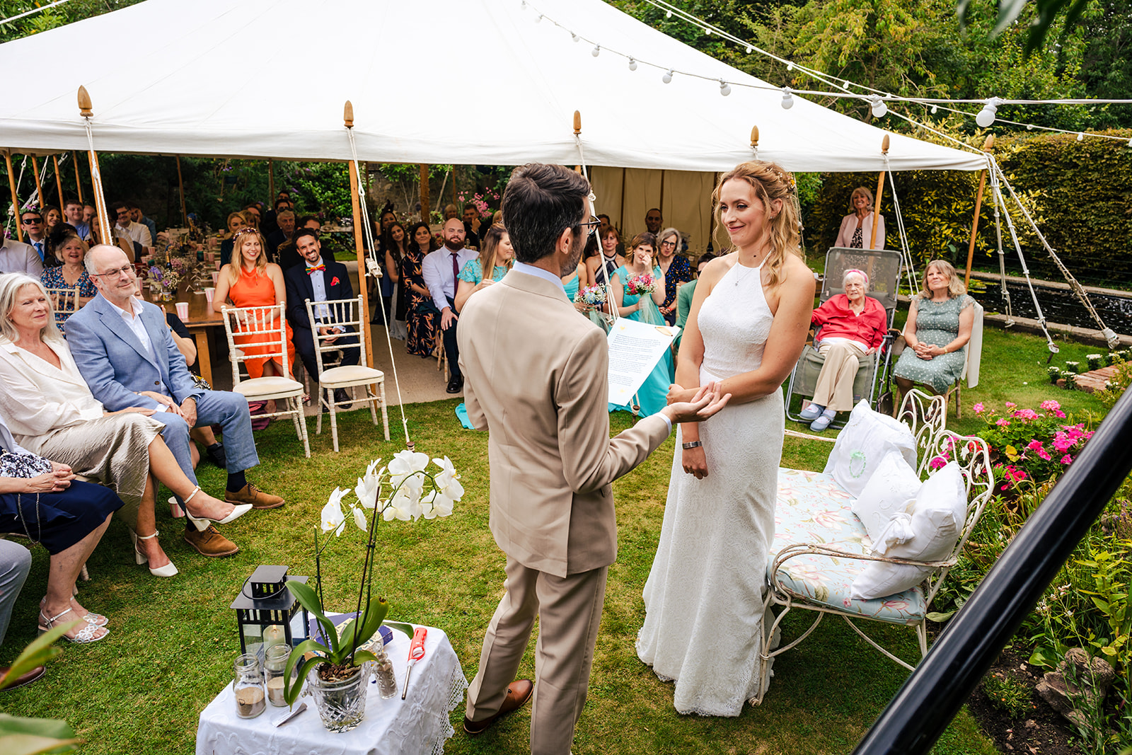 No-waste wedding ceremony under a garden tent in Sussex.